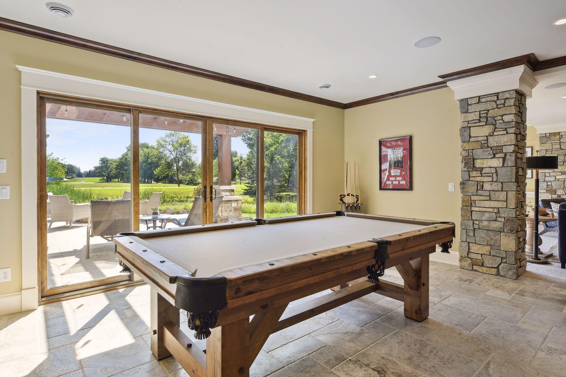 Game room area sized for billiards table, wired for light fixture above table