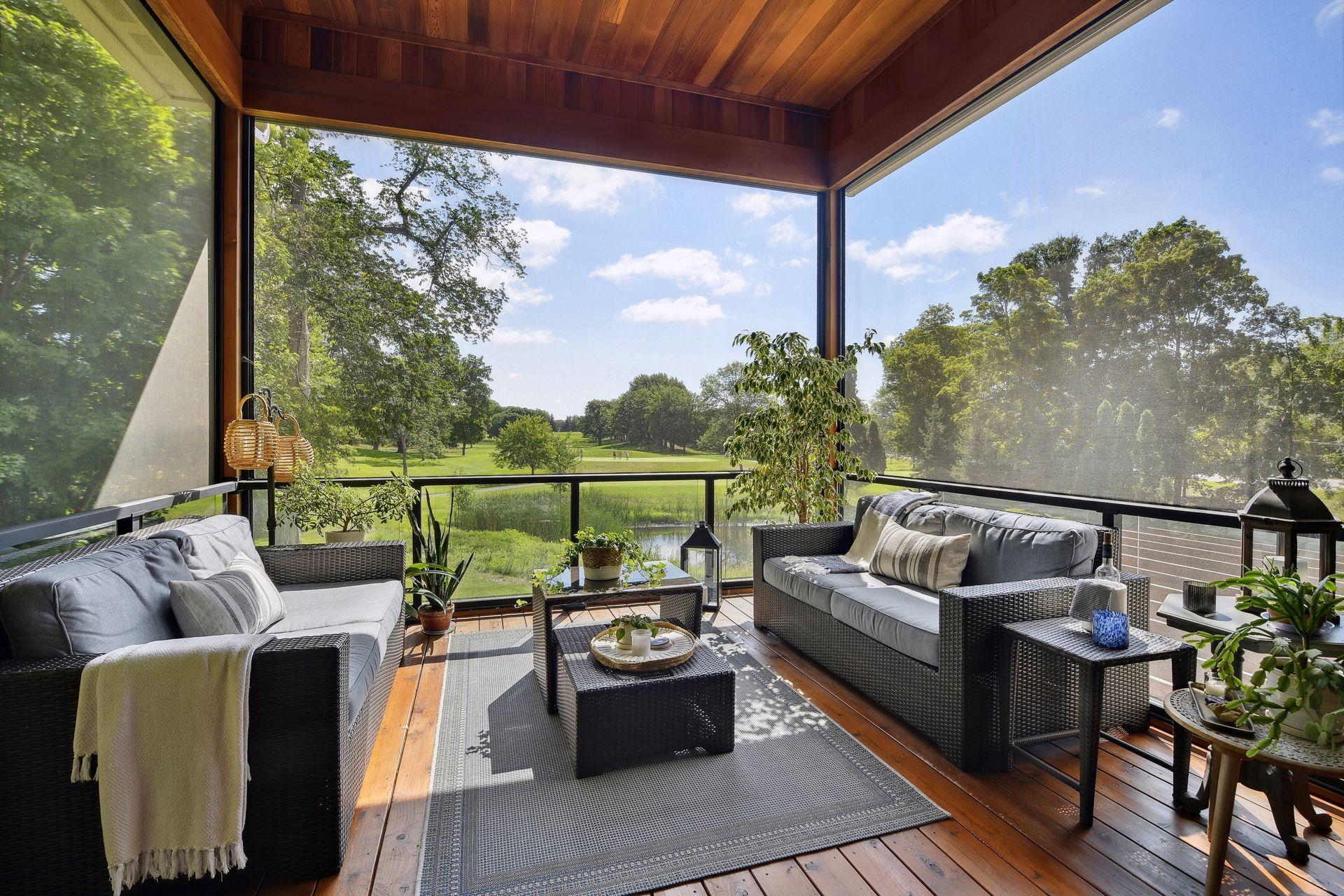 Screen porch has glass rail system, motorized remote controlled screens, celing lighting with dimmers, in-ceiling speakers, grill deck with natural gas hook-up