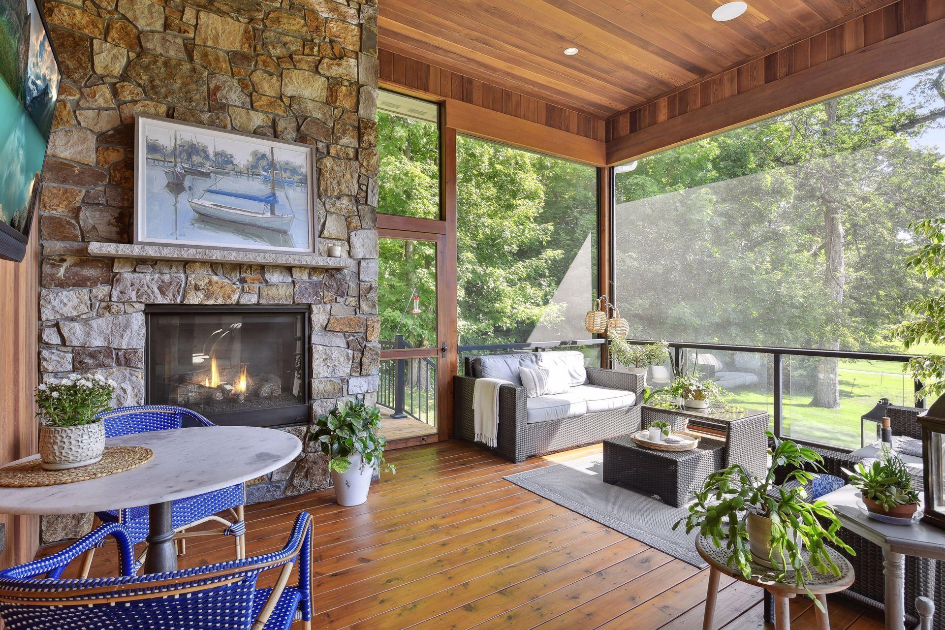 Screen porch with 12 feet ceiling, Cedar wood ceiling and walls, French door entry, natural gas fireplace.