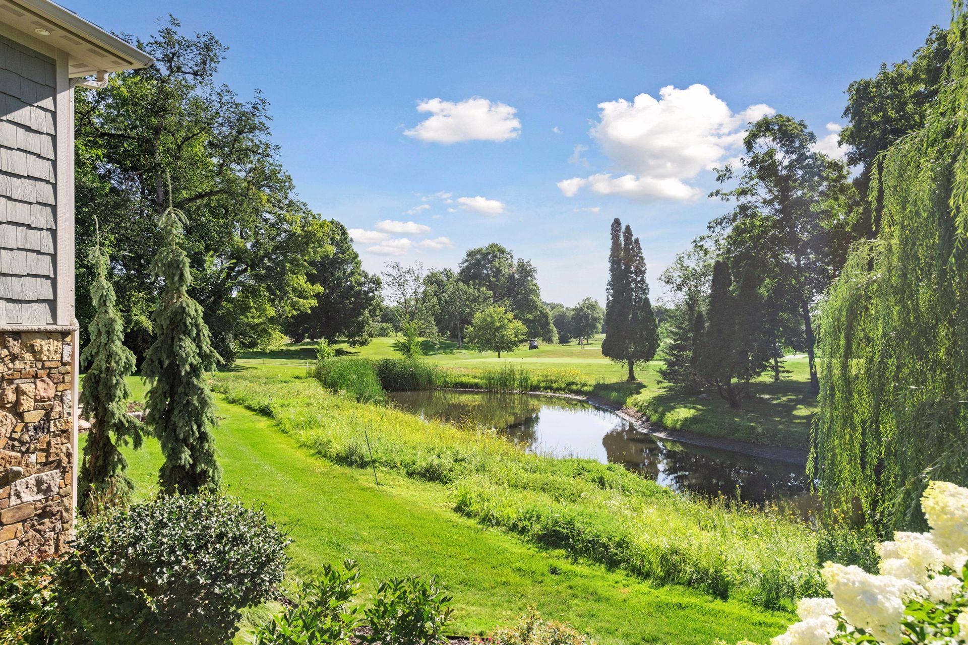 Professionally landscaped yard with Hydrawise appp control for irrigation system