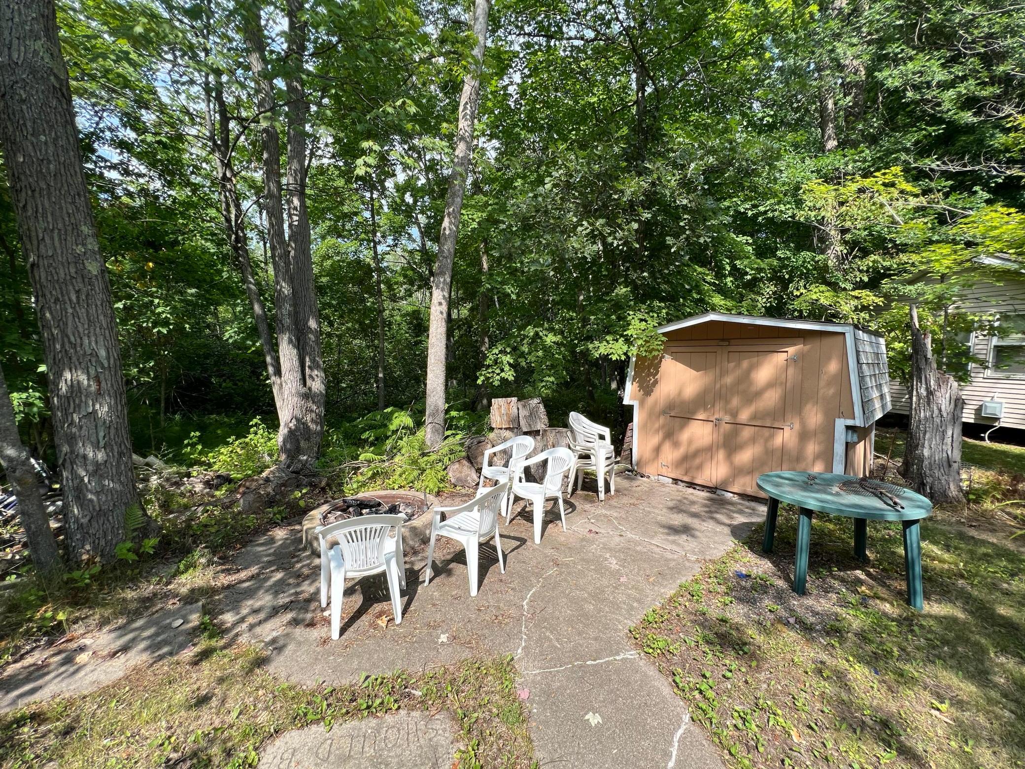 A look at the firepit and the shed.