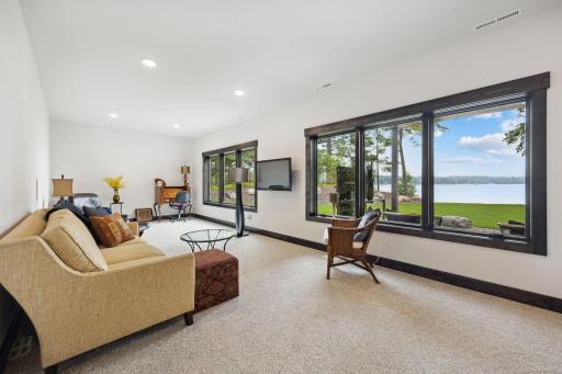 Lower-level family room with large windows - awesome lake views!
