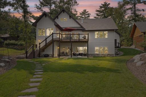 Welcome home to luxurious living on the Whitefish Chain - be ready for the summer!