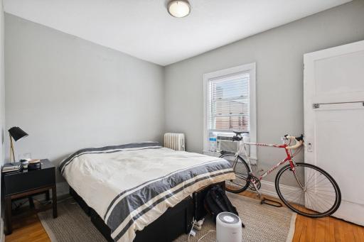 Spacious bedroom with a closet and access to the bathroom. East window to see the sun in the morning!