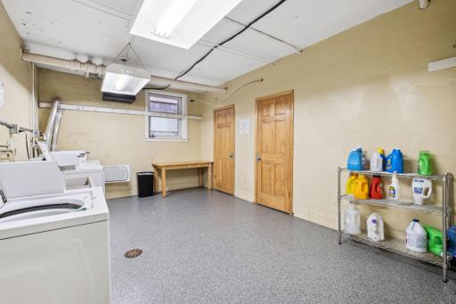 Nicely maintained laundry room in the lower level with flooring redone. Some storage down here too.