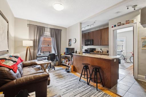 Great corner unit has a nice living room/kitchen with the bedroom in the back.