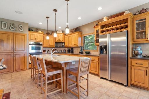 Custom kitchen with recently upgraded granite island.