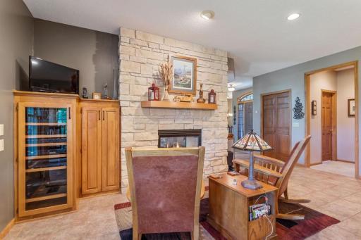 Hearth area with custom cabinet for in-home audio..