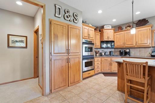 Large pantry with pullout drawers.