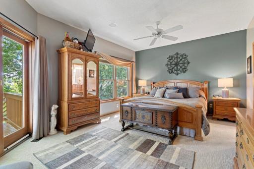 Large primary bedroom with room for seating.