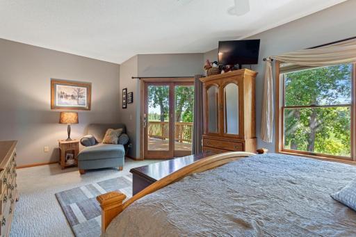 Primary bedroom has access to deck.