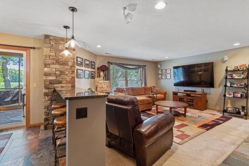 Large open family room with full surround sound audio.