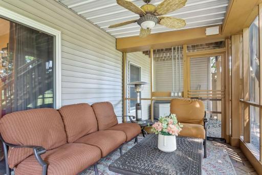 Screened porch has electical with lighted ceiling fans and home audio.