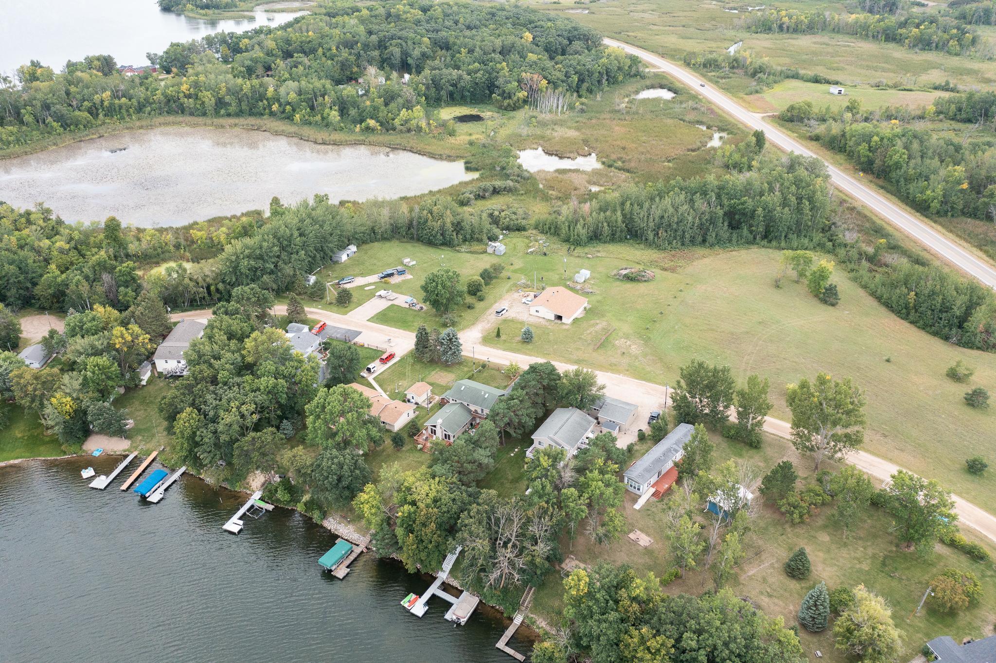 Lake lot & 3 acre backlot w/garage