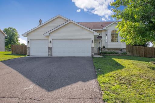 Four level split home with new concrete apron. At the front of the property there is a french drain along with recent landscaping under the bay window. New awning post (weather treated) at the front door.
