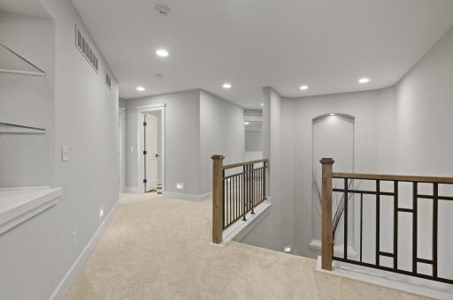 Spacious and tasteful landing with detailed Arts and Crafts design.