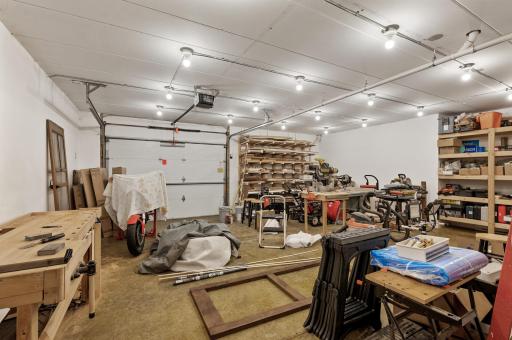 Entire lower level garage for up to 3 cars. Stained concrete floors and heated!