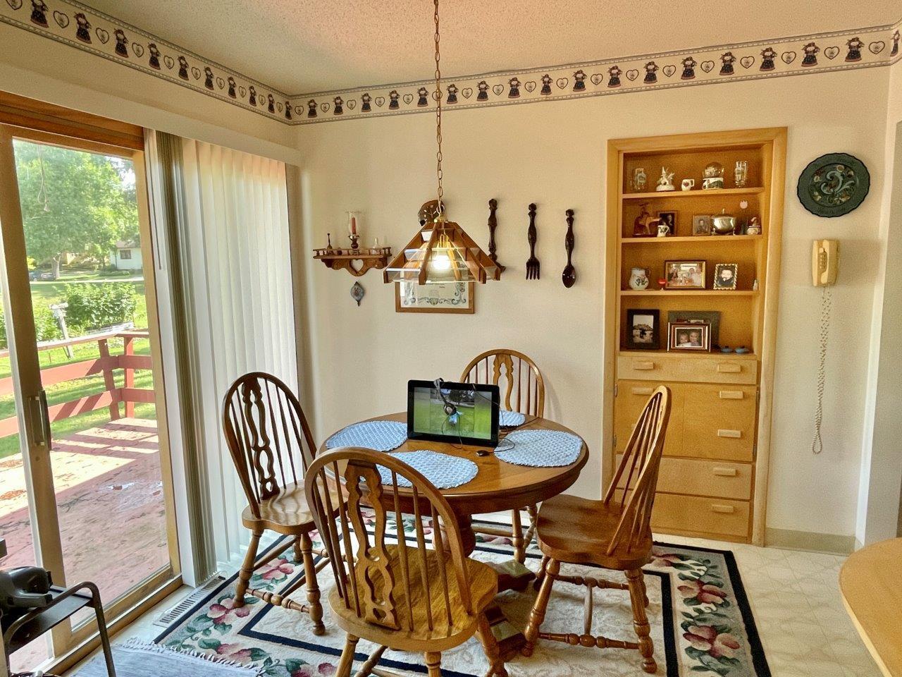 4-Dining room walks out to backyard deck (2).jpg