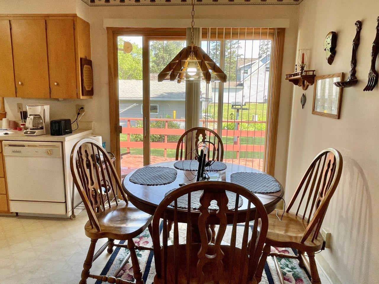 4-Dining room walks out to backyard deck (1).jpg