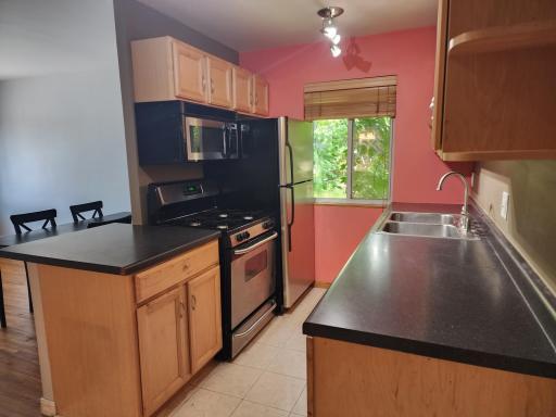 Full size kitchen with a window.