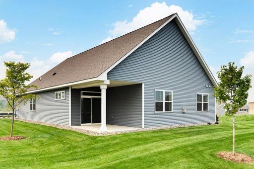 The Dover home comes included with a covered rear patio or deck on basement lot homesites. Fantastic for enjoying the outside in all the elements! Model photo. See listing agent for home specific exterior color package.