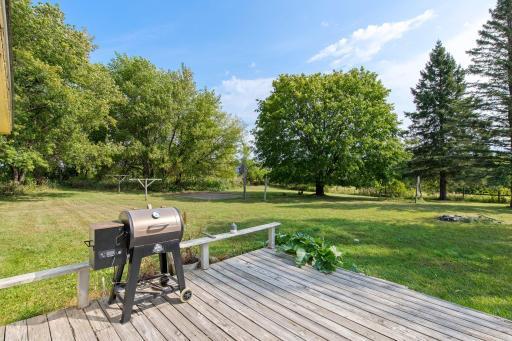Deck area overlooking a large yard