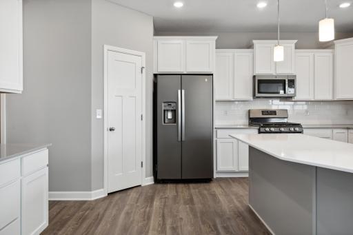 Home is equipped with a walk-in pantry! Colors and options may vary.