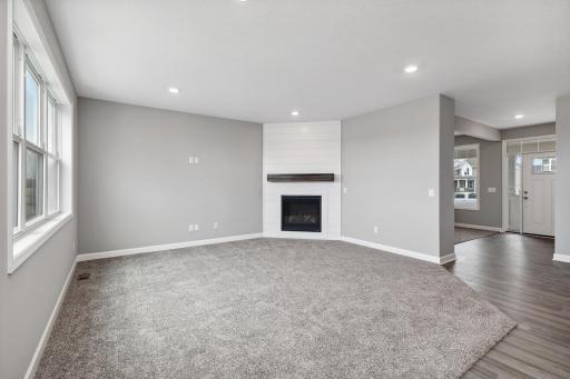 Main Floor Family room offers loads of natural light. Options and colors may vary.