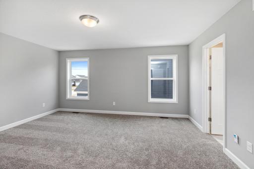 Spacious Owner's retreat. Definitely enough room for a king bed!