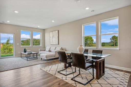 Picture of a model home with the same floorplan and similar features.