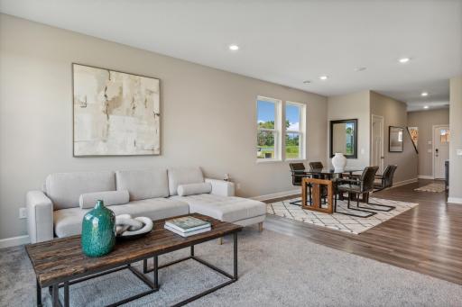 Picture of a model home with the same floorplan and similar features.