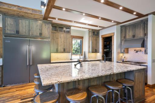 Gourmet Kitchen profiling Viking Professional Series appliances, 2 dishwashers, trash compactor and Butler Pantry.