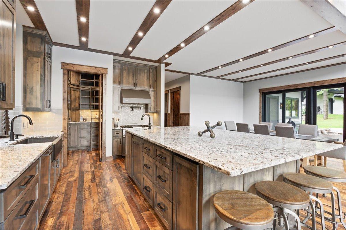 This center island is HUGE! 6'x10' and ready to entertain. The island also has a trash compactor, dishwasher and touch on/off sink.