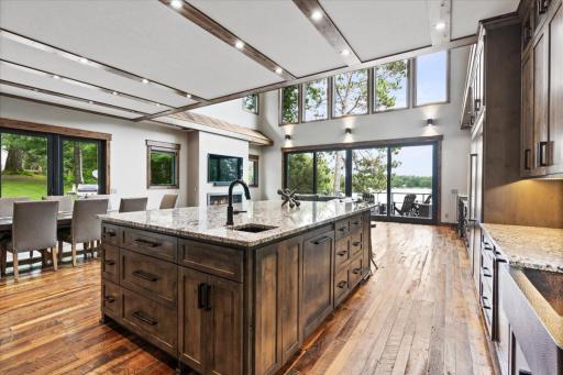 Beautiful Lake views from within the kitchen. The custom Kentucky Barnwood Floors will really catch your eye. Featuring 6 different types of Barnwood throughout areas of the house and detached garage.