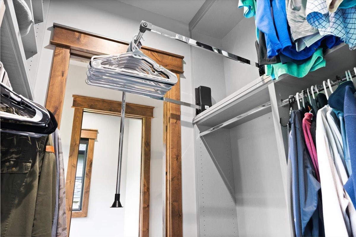 Pull Down upper racks to access clothing.