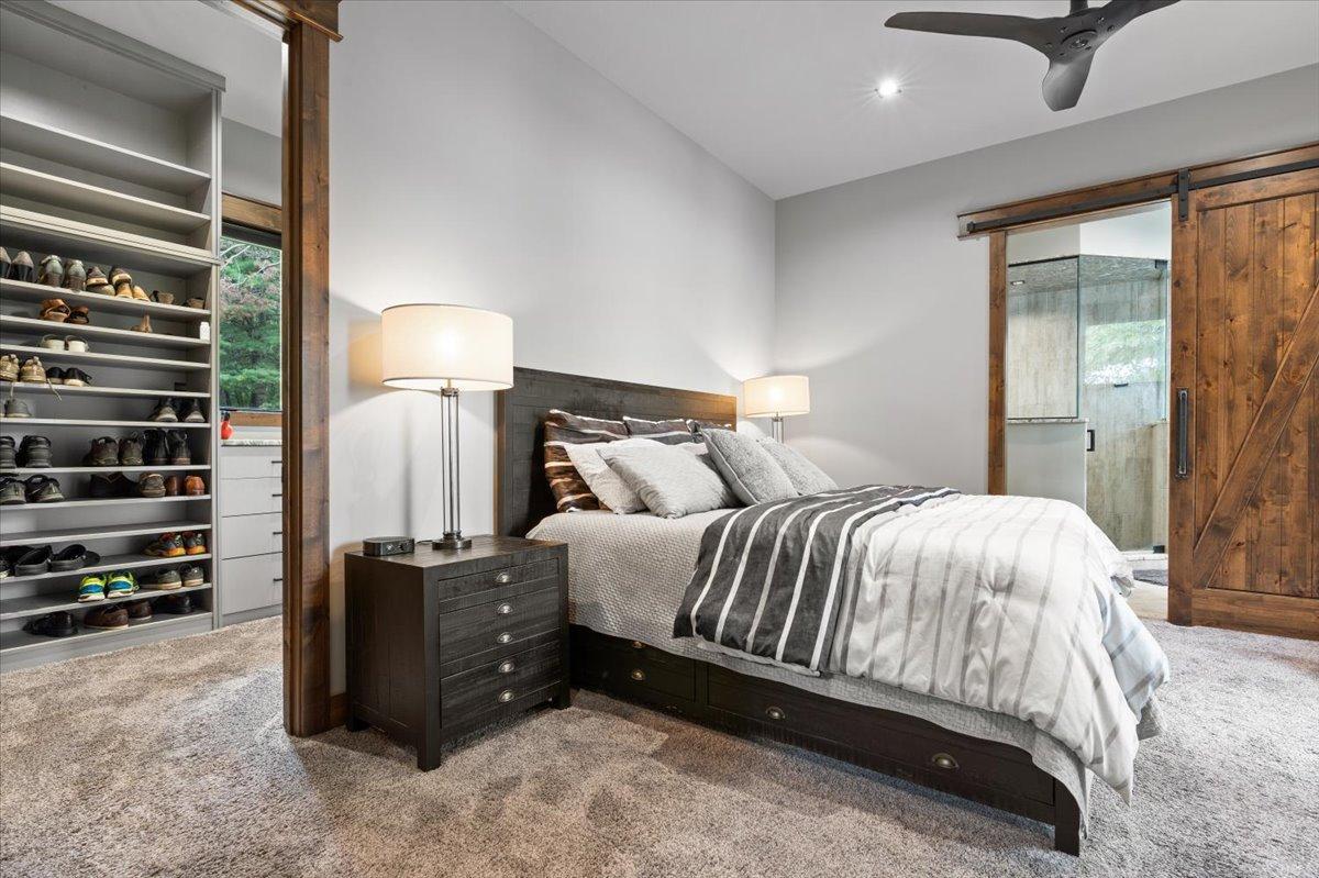 Master Bedroom with a large walk-through closet leading into the Master Bath.