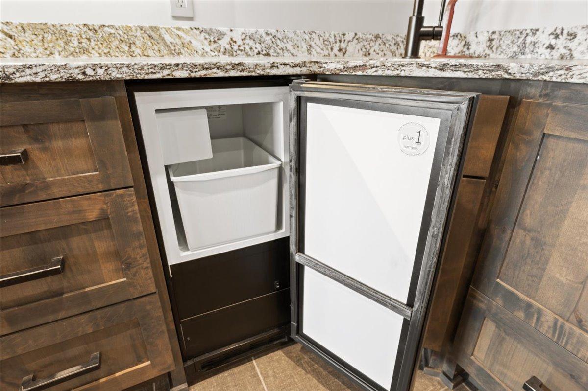 Ice-maker in the basement wet bar.