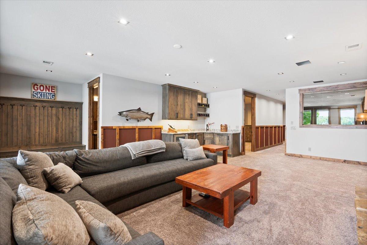 Smoked glass hides the exercise room on the lower level.