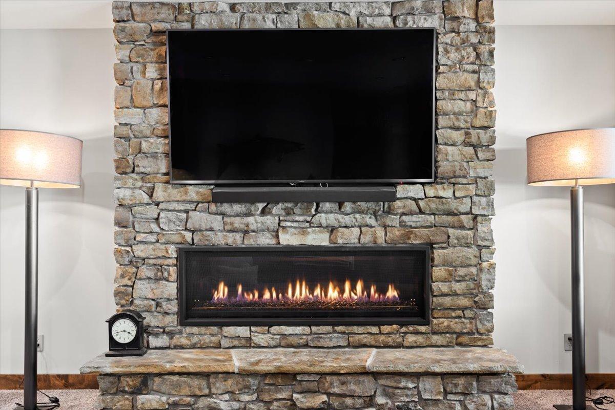 60 inch Lineal Fireplace in the lower level family room.