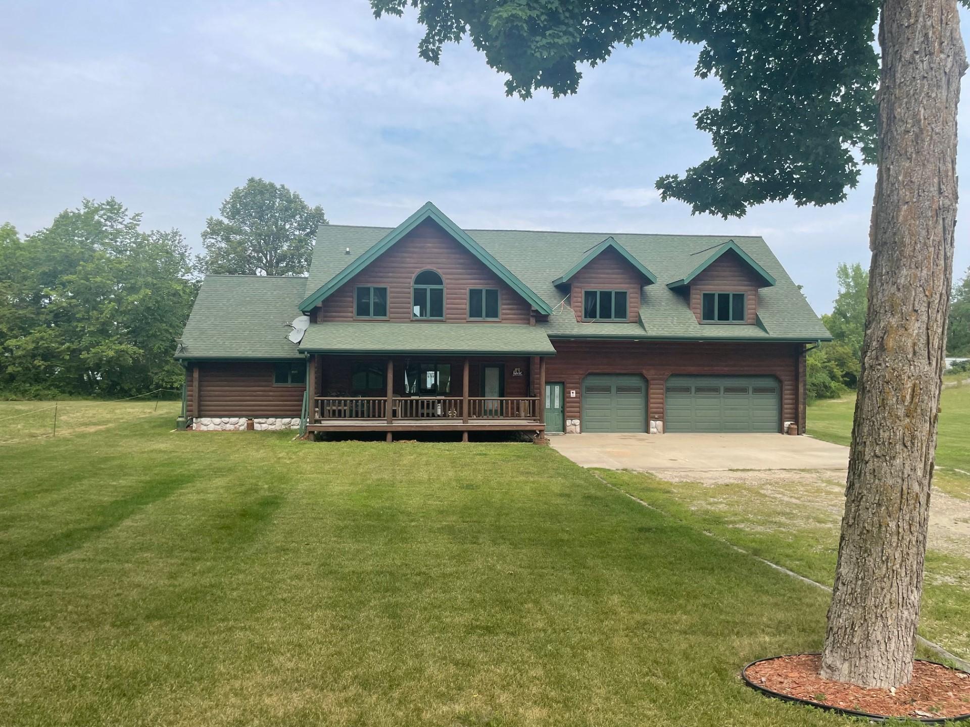 Cedar Log Home with Front Porch