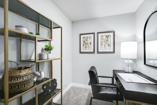 The upper-level flex space shown here as an office. You could also use this as an additional closet or hobby room!