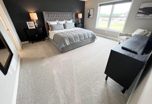 Primary Suite. *Please note, photos are of a similar model home, features and colors in actual home will vary. Please contact listing agent for exact specifications.