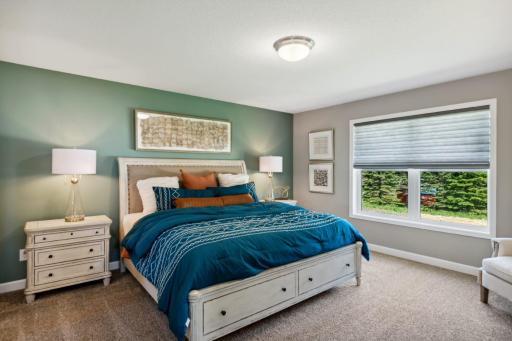 Lewis primary suite. *Please note, photos are of a similar model home, features and colors in actual home will vary. Please contact listing agent for exact specifications.