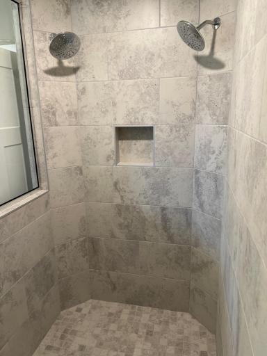 Serenity bathroom walk in shower. *Please note, photos are of a similar model home, features and colors in actual home will vary. Please contact listing agent for exact specifications.