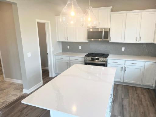 Kitchen with upgraded quartz countertops!