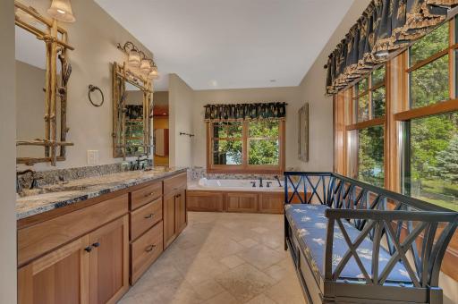 Spa-like owner's en suite is designed to provide an experience that redefines relaxation.