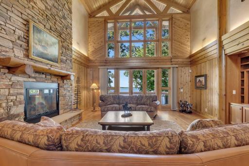 Massive windows/door frame the picturesque lake views allowing you to enjoy the amazing scenery.