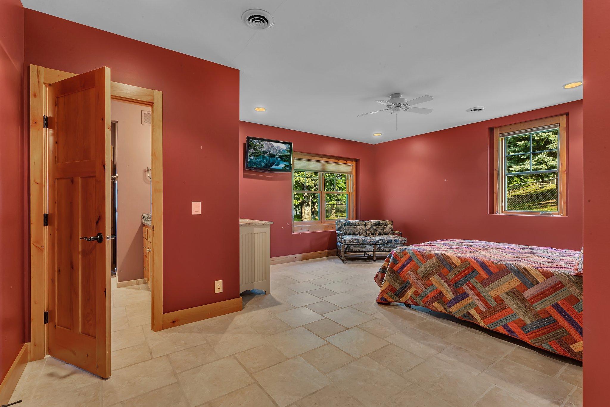 2nd lower level bedroom with connecting bathroom.