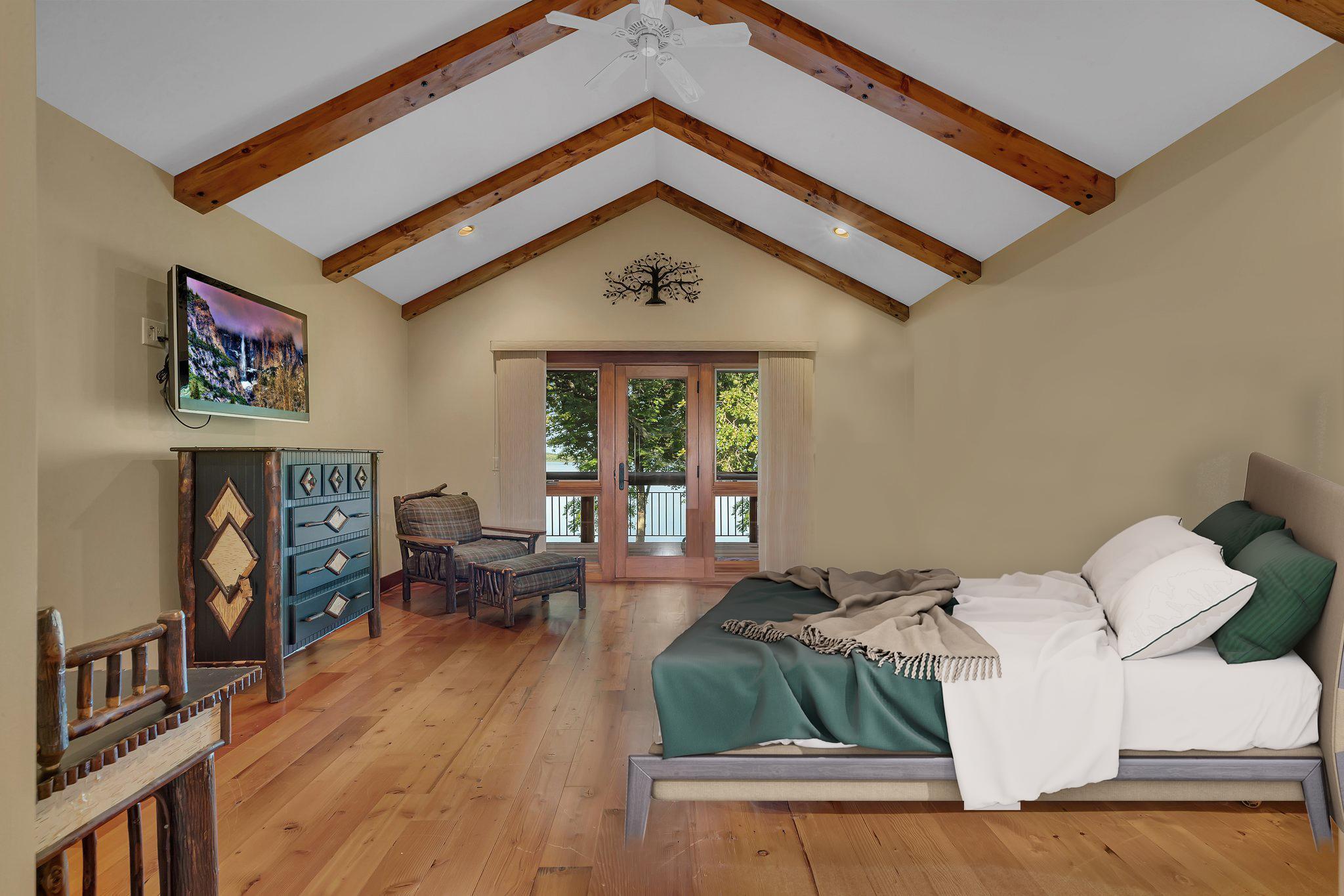 Unwind in the luxurious owner’s suite, complete with a private deck overlooking the lake.