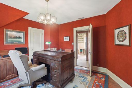 Upper level second bedroom with two closets. A full bath across the hall services the secondary bedrooms.